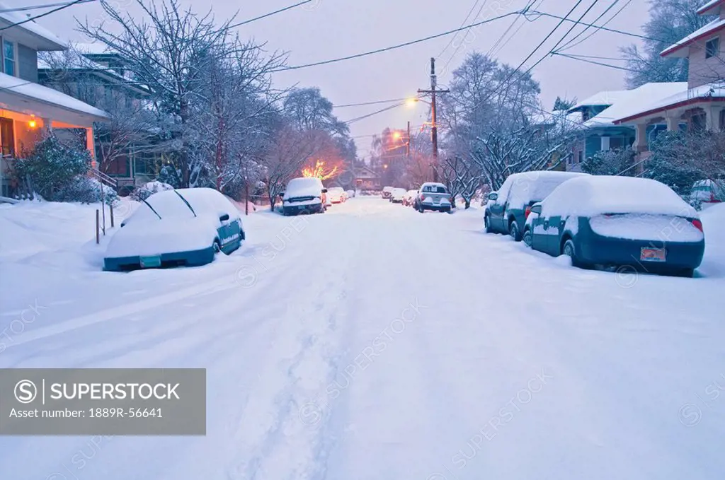 snow covering a residential street se 35th avenue, portland, oregon, united states of america