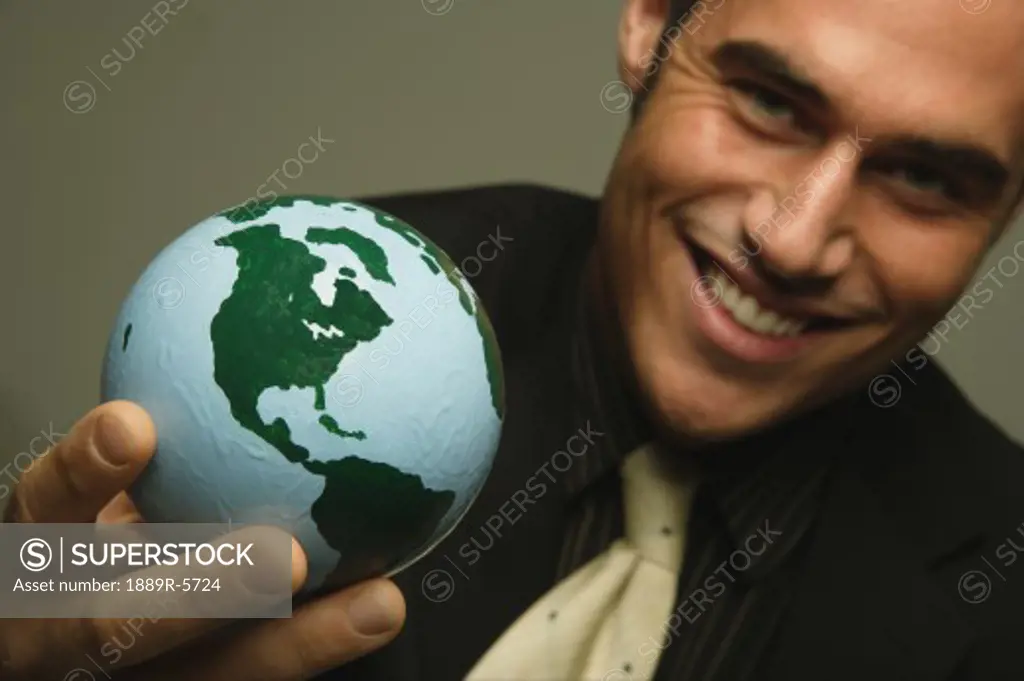 Businessman with the world in his hand