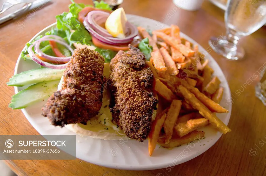 a plate of fried foods and salad, tofino, british columbia, canada