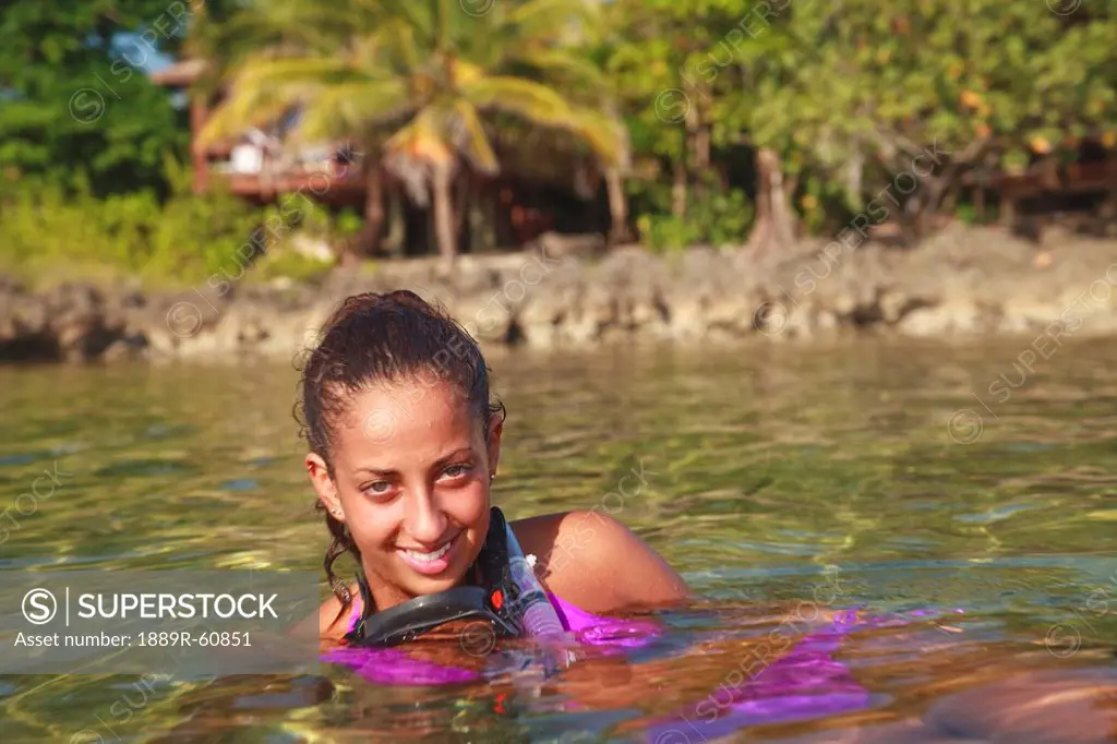 Roatan, Bay Islands, Honduras, A Young Woman With Snorkeling Gear At Anthony´s Key Resort
