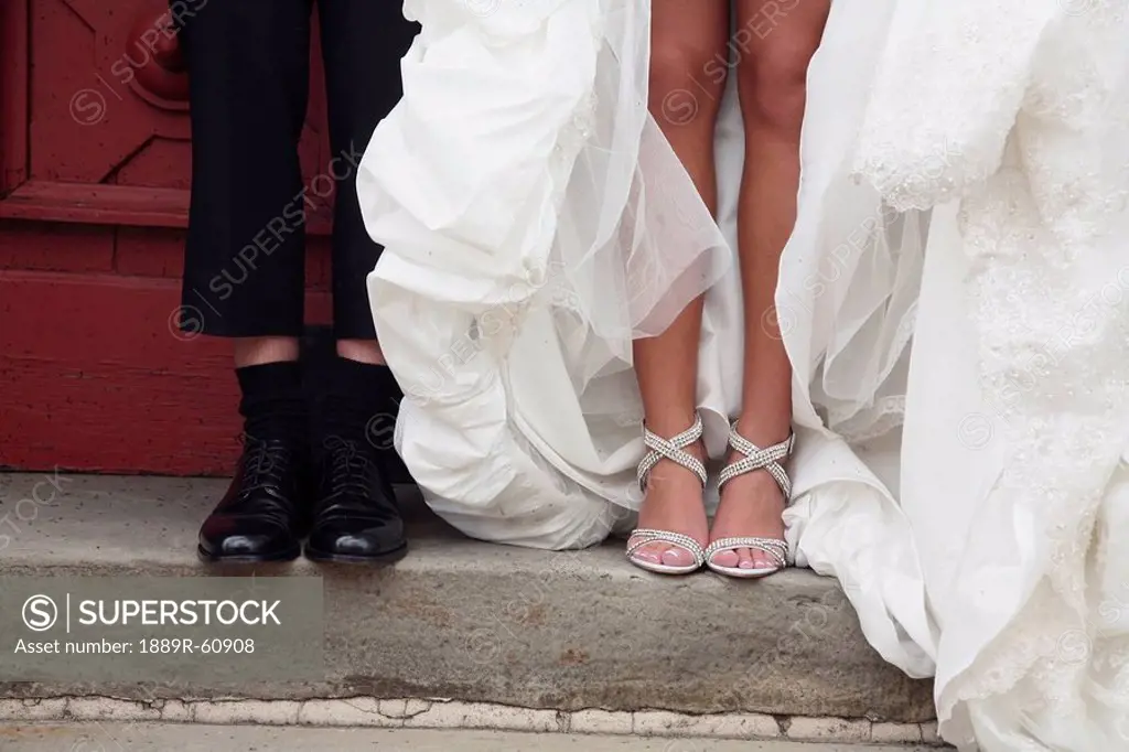 Hamilton, Ontario, Canada, The Feet Of A Bride And Groom