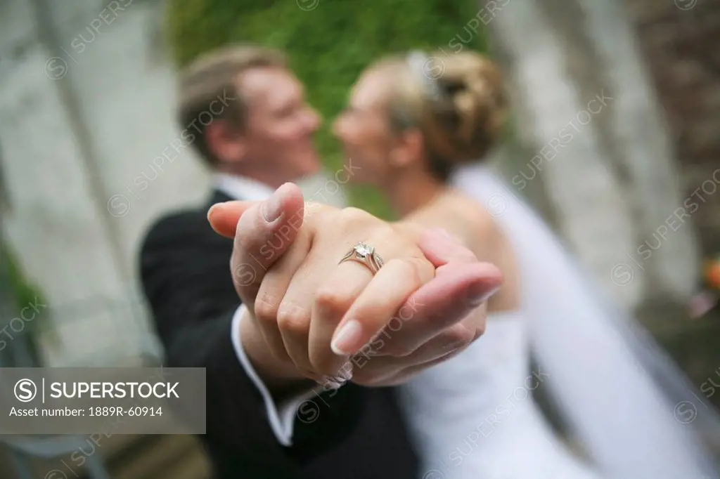 Welland, Ontario, Canada, A Bride And Groom In Holding Hands Out In A Dancing Pose