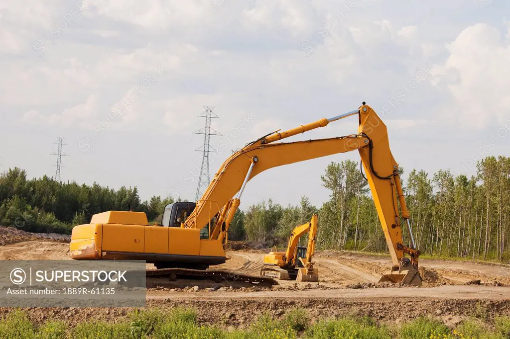 Road Construction Using A Backhoe, Edmonton, Alberta, Canada