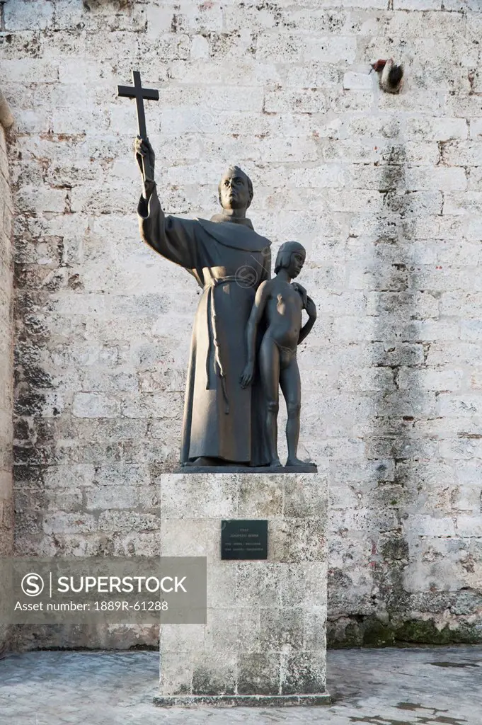 A Monument Of Fray Junipero Serra With Juaneño, An Indian Boy, At The Front Of The 16Th Century Basilica Menor De San Francisco De Asis In Plaza De Sa...
