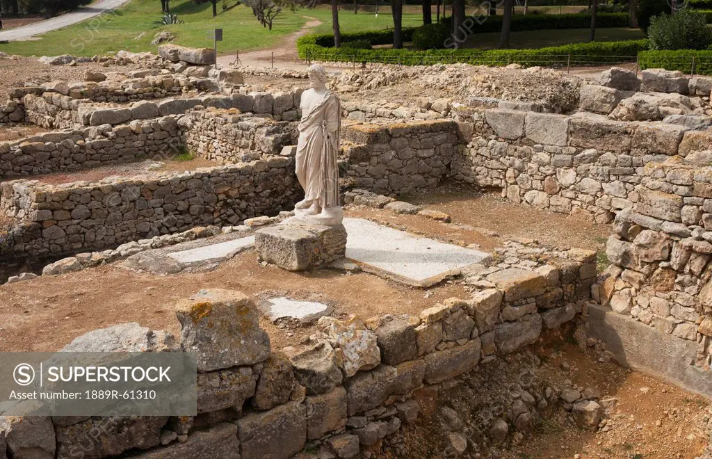 Statue In The Greek City Of The Empuries Ruins, Castello D´empuries, Spain