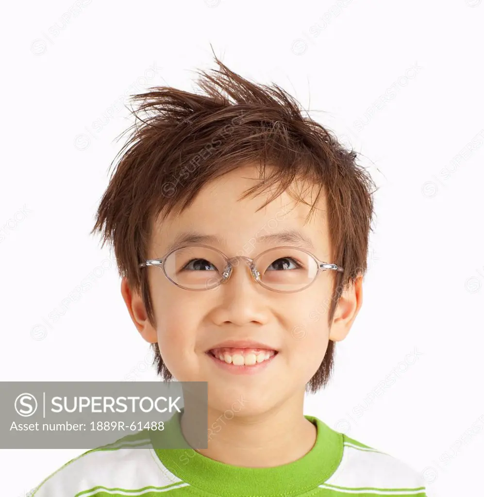 A Boy With Glasses And Styled Hair