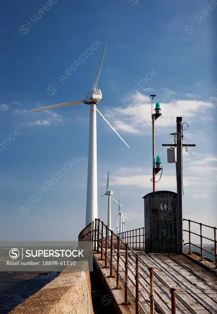 Wind Turbine On A Pier Along The Coast, Blyth, Northumberland, England