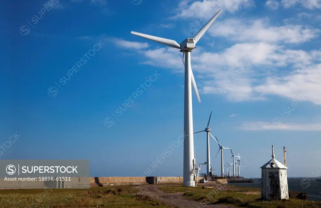 Wind Turbines On A Pier Along The Coast, Blyth, Northumberland, England