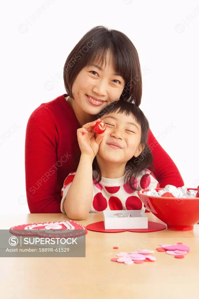 A Mother And Daughter Making Valentine´s Day Crafts