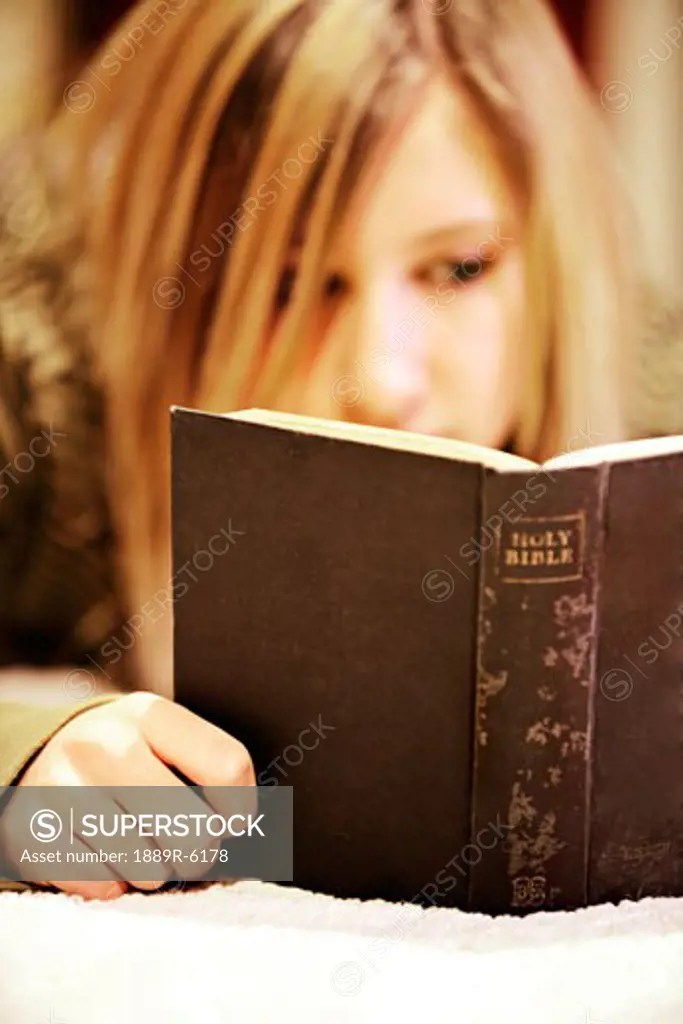 Reading her Bible