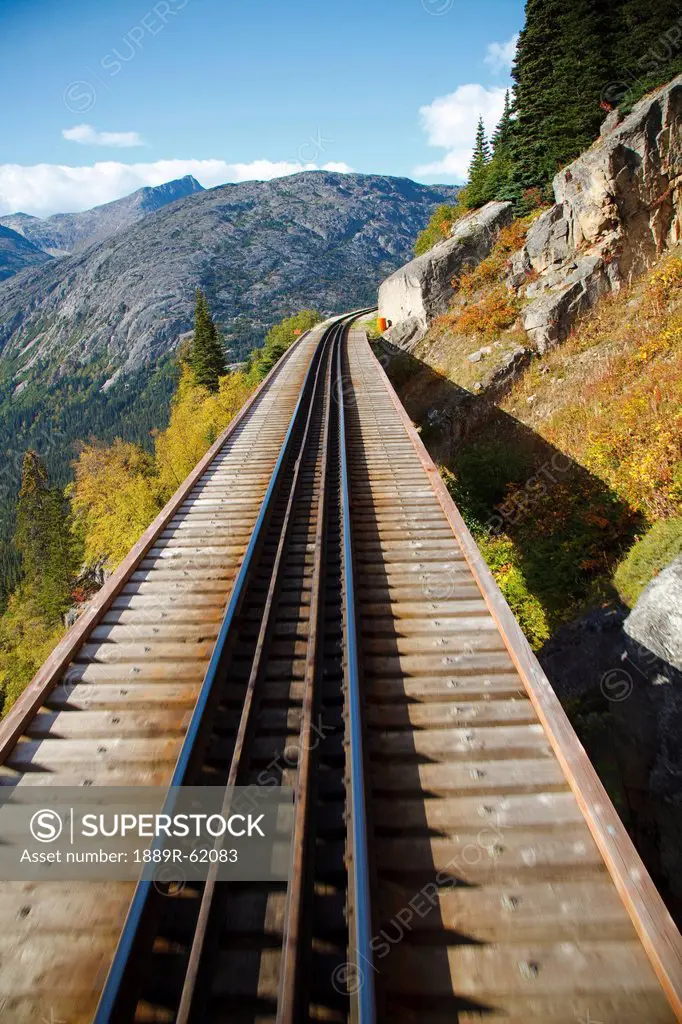 trestle of the historic train in white pass & yukon route in the coast mountains, skagway, alaska, united states of america