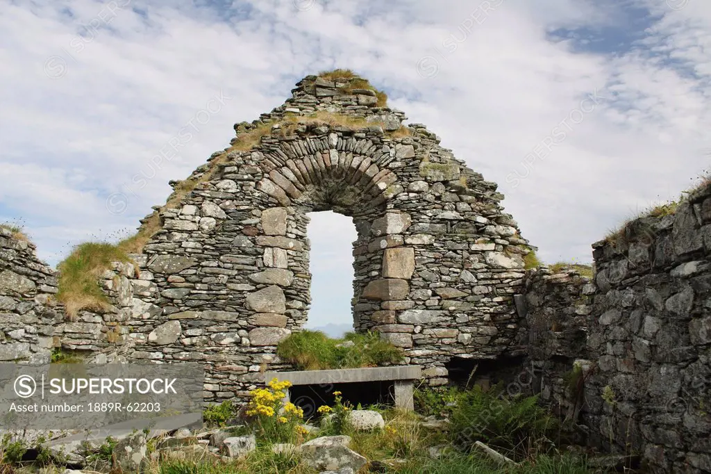 window frame in ruins of st. colman´s abbey on inishbofin island off the coast of galway in connacht region, county galway, ireland