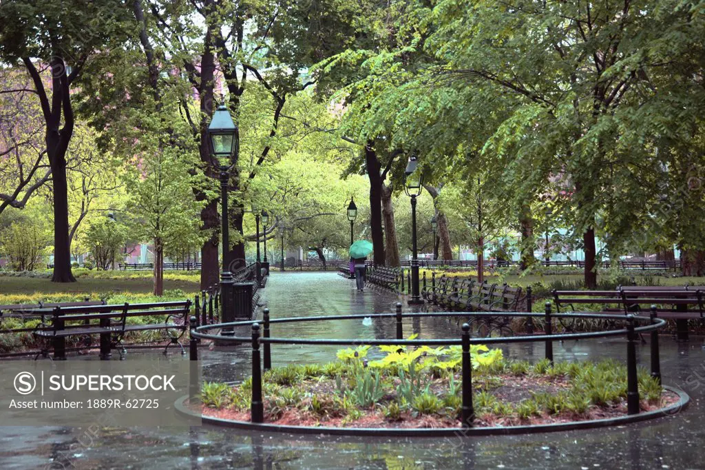 paths in a park area on a wet day, manhattan, new york city, new york, united states of america