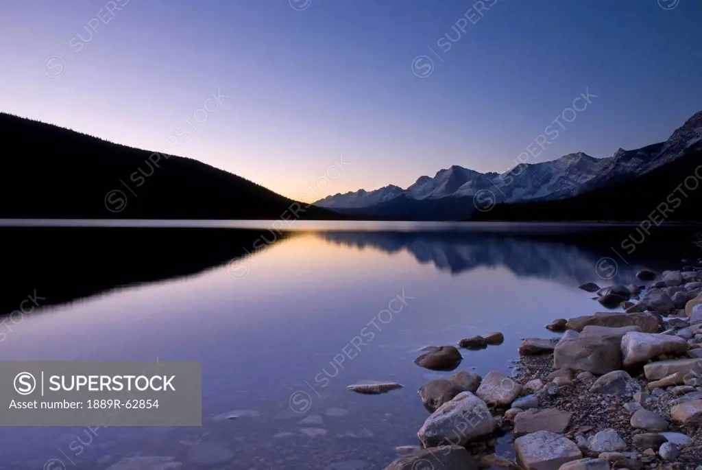 sunrise on the upper lake of kananaskis, alberta, canada