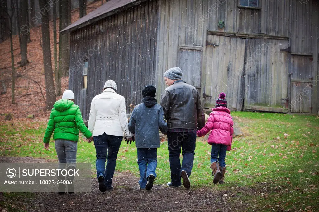 a family walking down a path, grimsby, ontario, canada