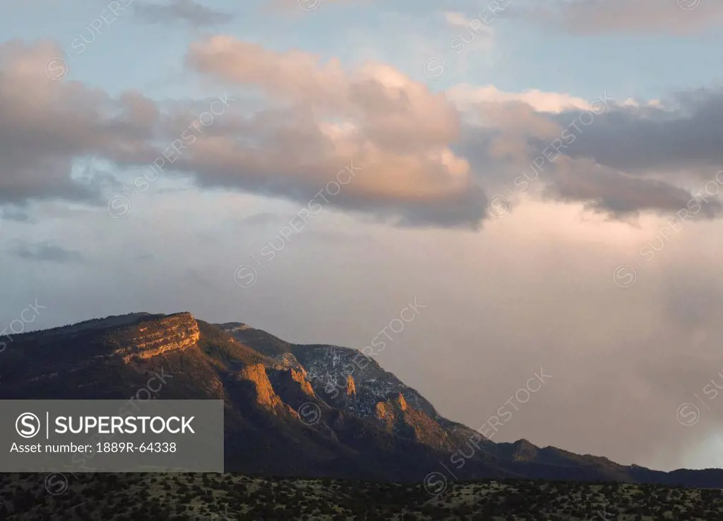 last light of the setting sun catches the sandia mountains, viewed from placitas, new mexico, united states of america