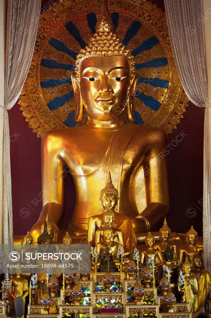 buddhist statue in wat phra singh temple, chiang mai, thailand