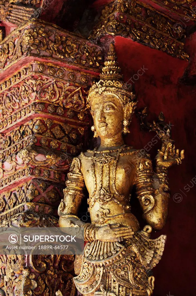 statue in wat phra singh temple, chiang mai, thailand