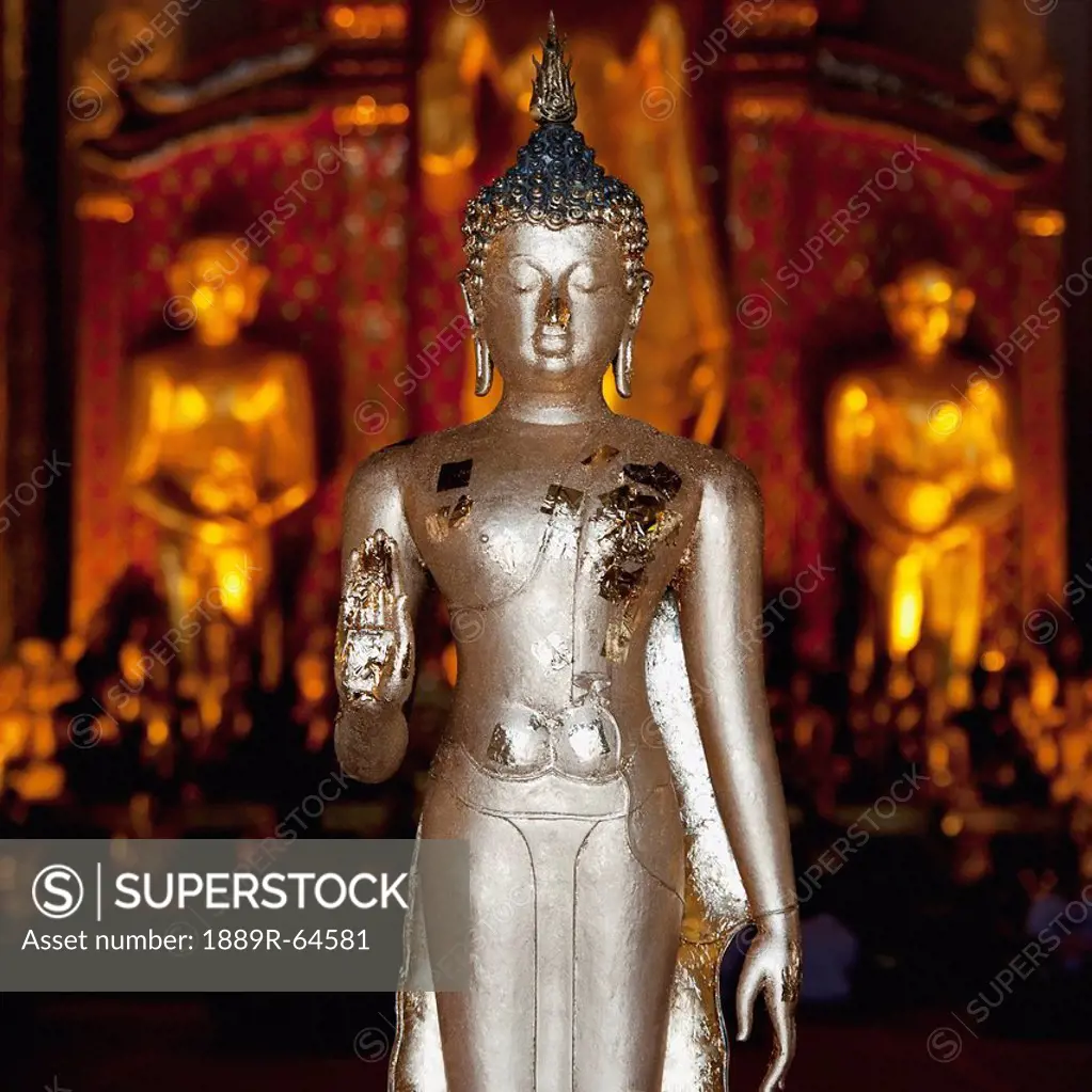 silver statue at wat phra singh temple, chiang mai, thailand