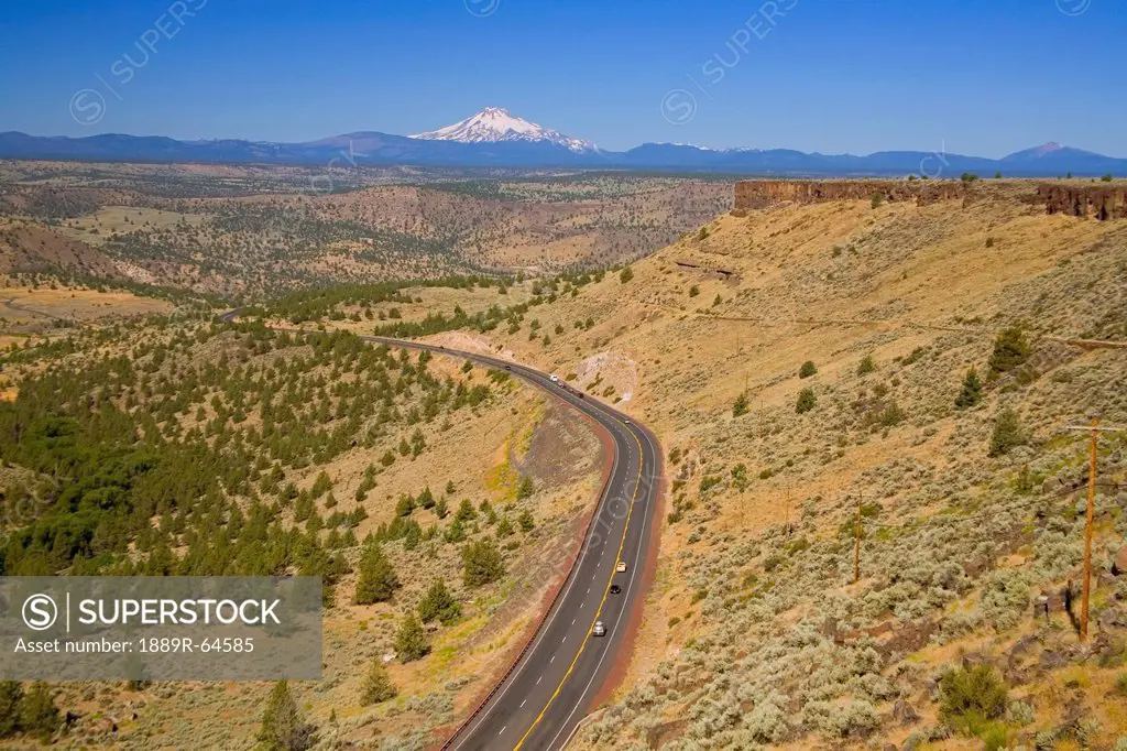 road with mount hood in the background, oregon, usa