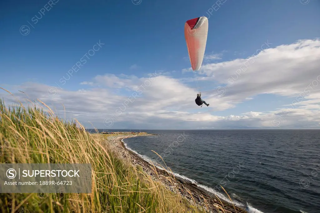paragliding on the west coast, clover point, victoria, vancouver island, british columbia, canada
