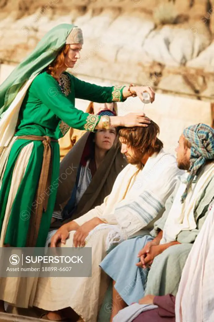 Woman pours oil on Jesus' head