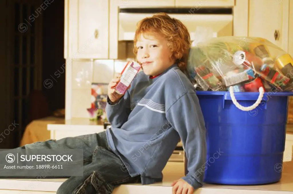 Child drinks juice box