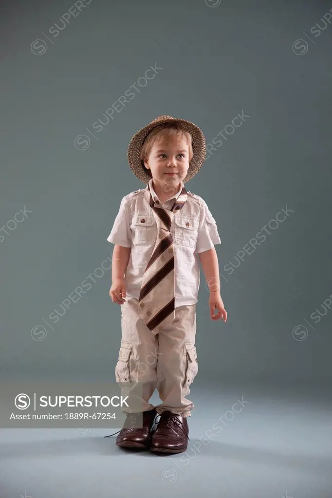 toddler with big shoes and a hat, jordan, ontario, canada
