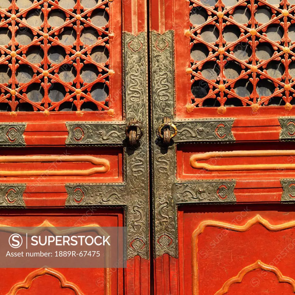 door detail of the forbidden city, beijing, china