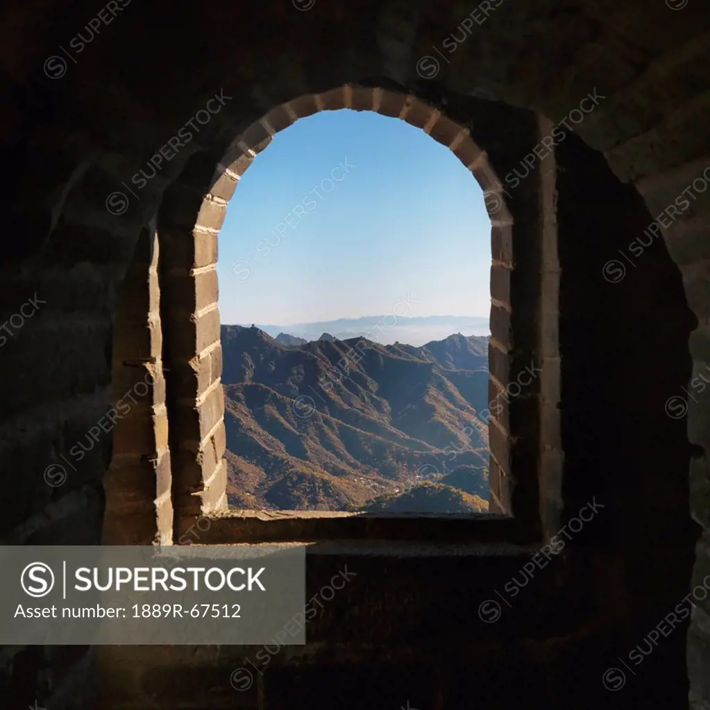 window in the mutianyu section of the great wall of china, beijing, china