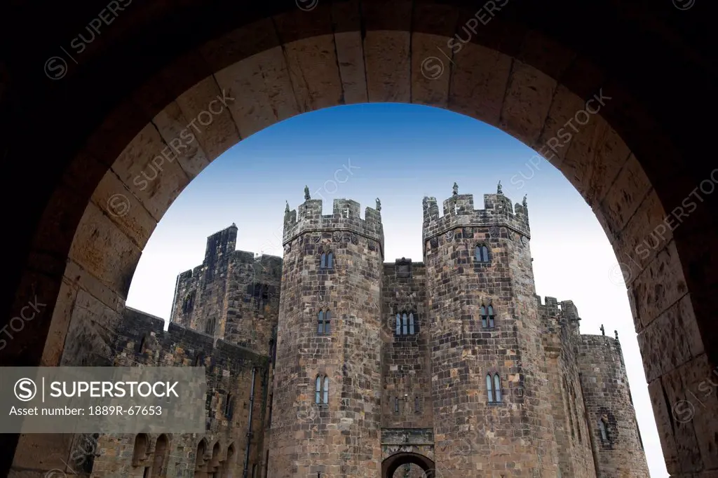 the alnwick castle, most famously known as hogwarts castle in the harry potter series, alnwick, england