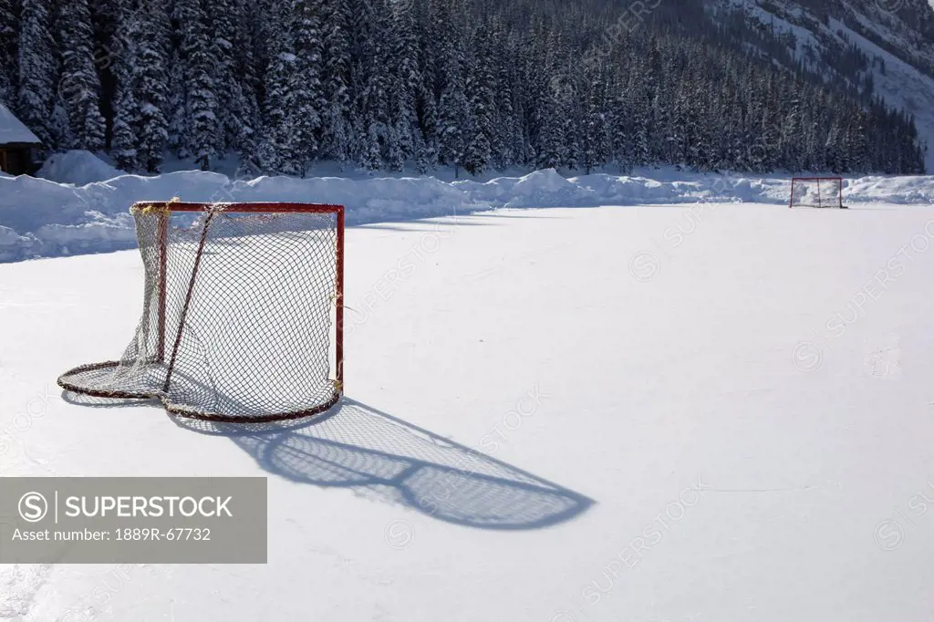 hockey net on outdoor ice rink, lake louise, alberta, canada