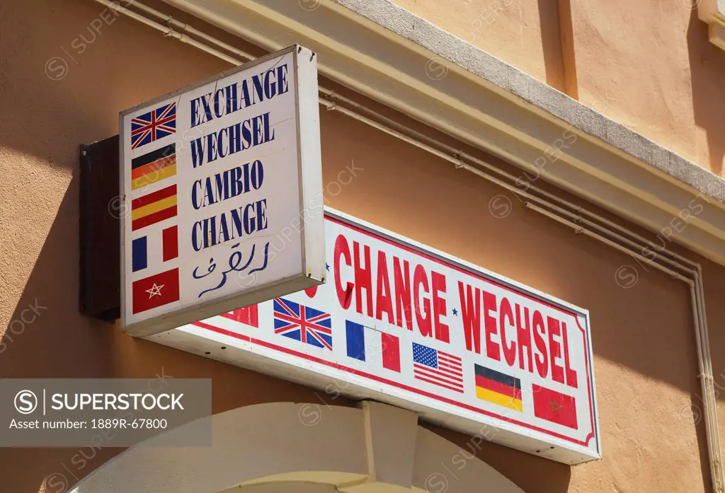 sign in five languages above money exchange shop, gibraltar