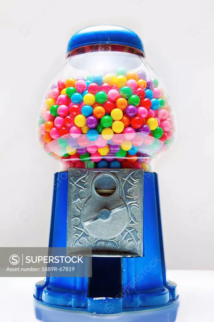 gumball machine full of colorful gumballs