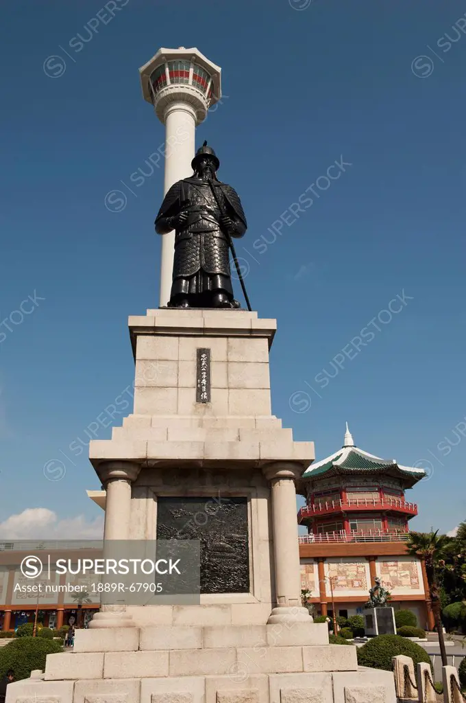 busan tower and statue of admiral yi sun_sin in yongdusan park, busan korea