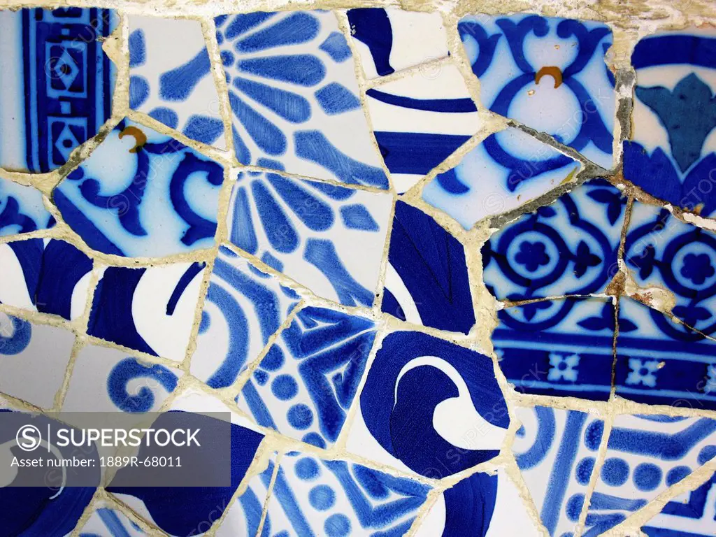 gaudi blue and white tiles in parc guell, barcelona catalonia spain