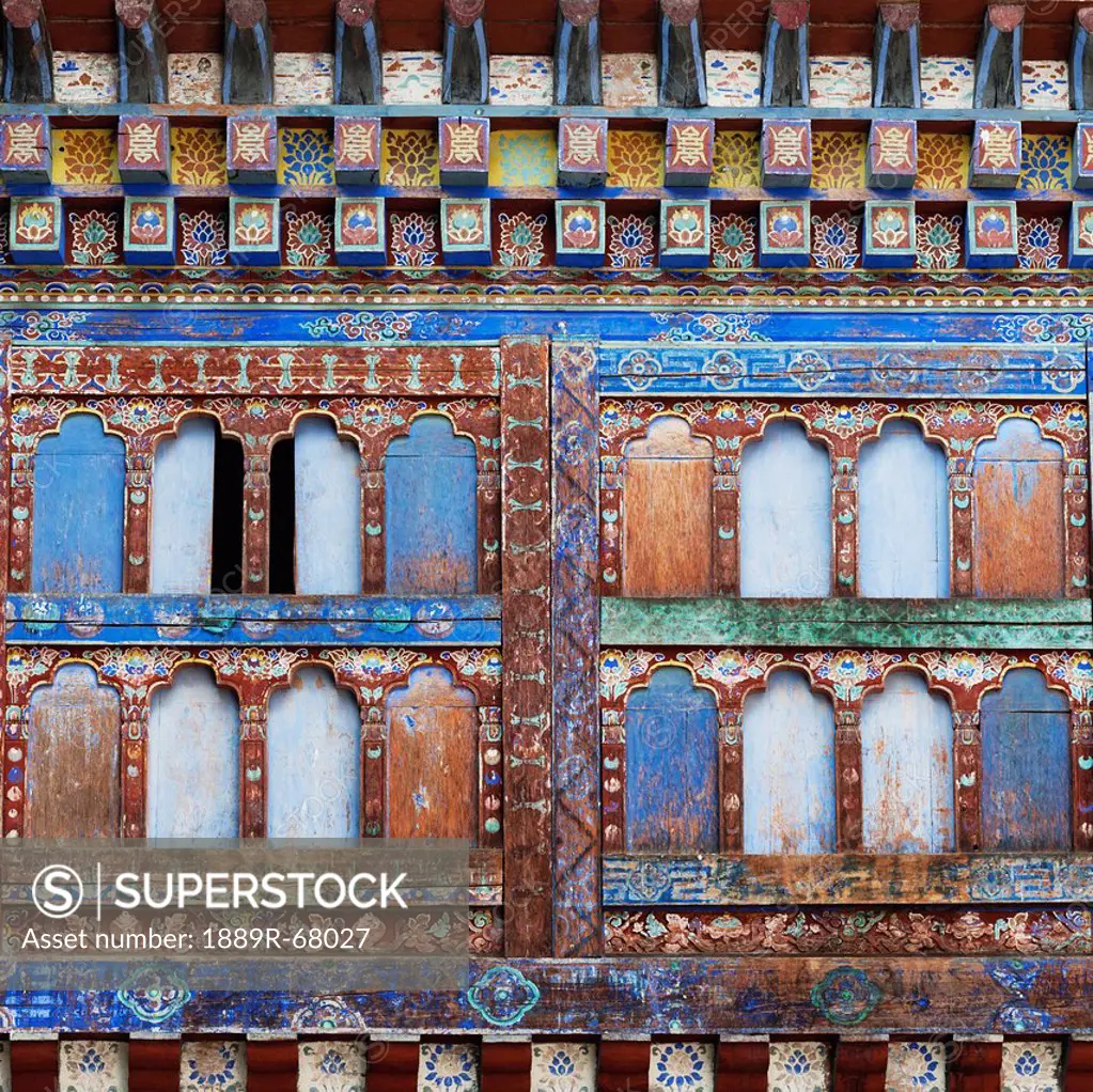 a colorful and ornate wall of wangdichholing palace, bumthang district bhutan