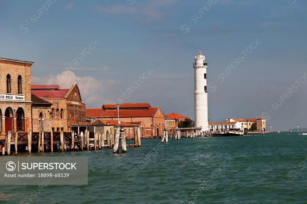 lighthouse along the canal, murano italy