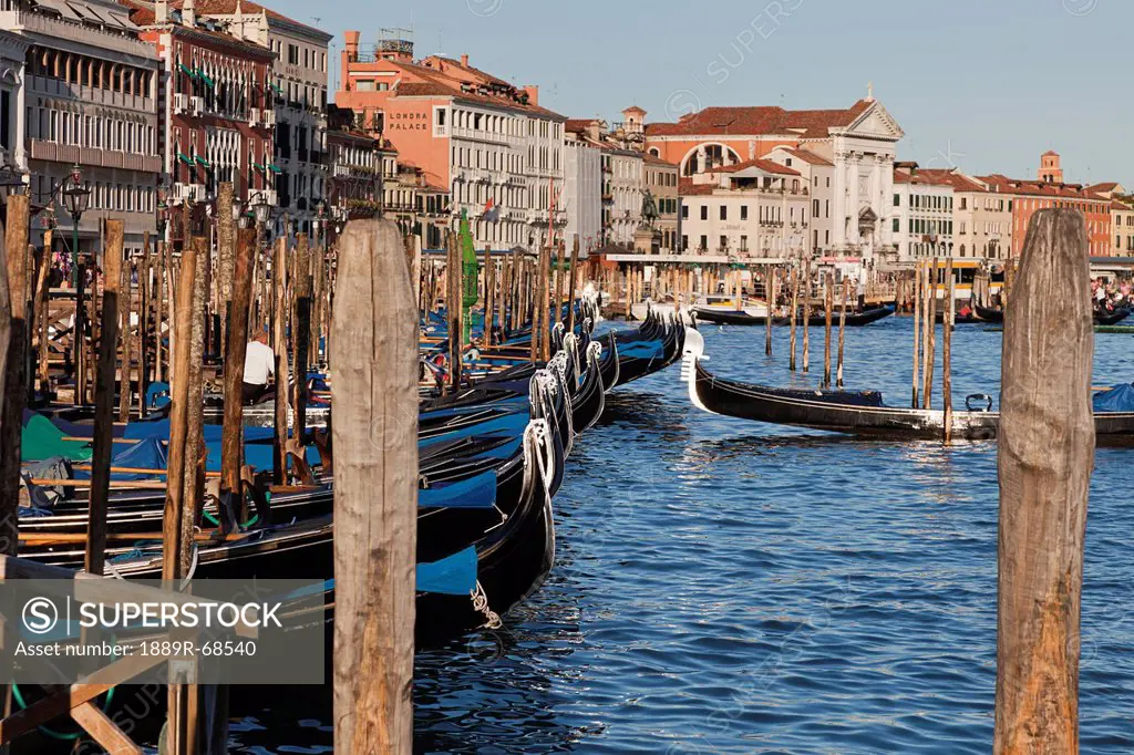 gondolas along the harbor, venice italy