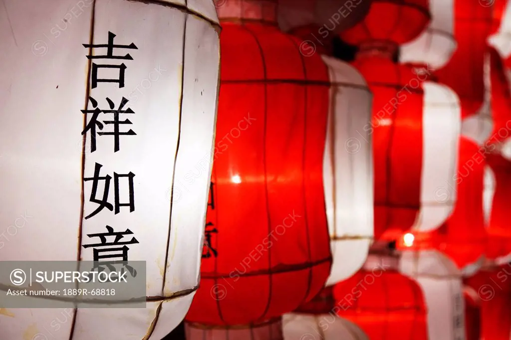 red and white chinese lanterns saying ´good luck´ in the chinese language, chiang mai thailand
