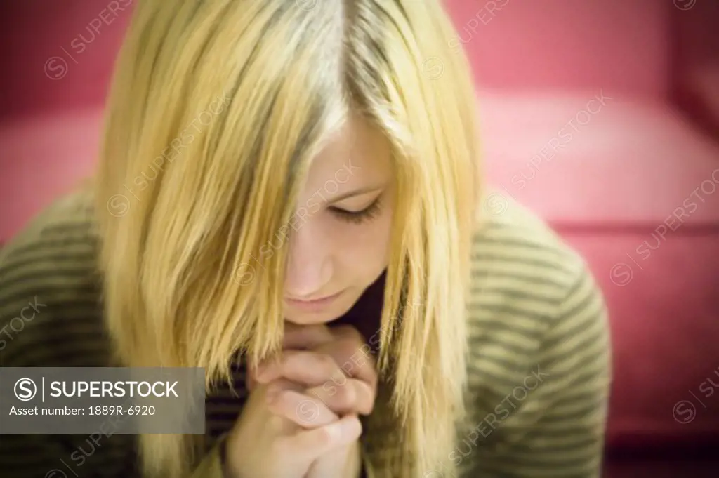 Teen praying