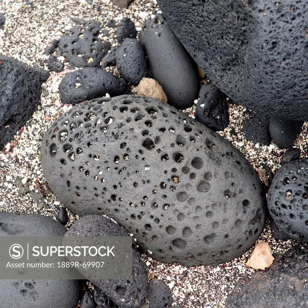 rocks with holes in them, galapagos, equador