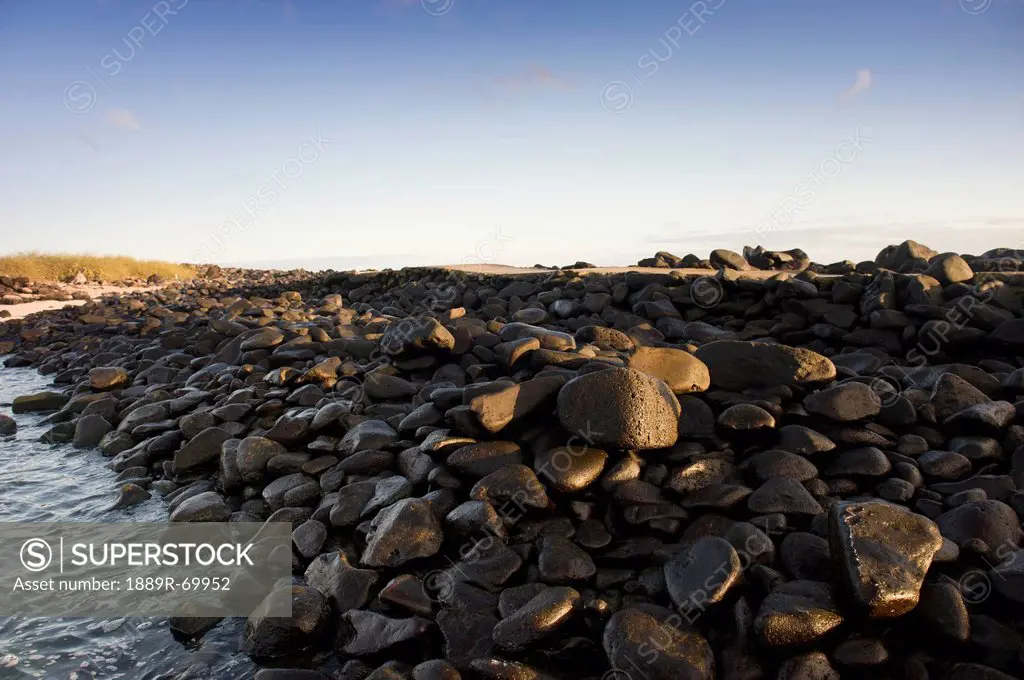 wet rocks on the coast, espanola island, galapagos, equador