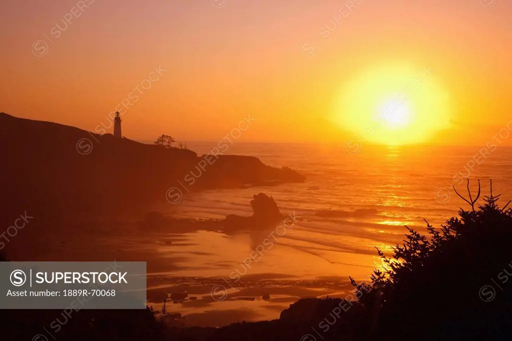 sunset over yaquina head lighthouse, newport oregon united states of america