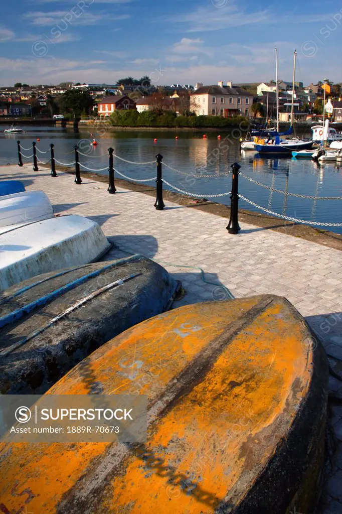 upturned boats on the quayside in kinsale town, county cork ireland