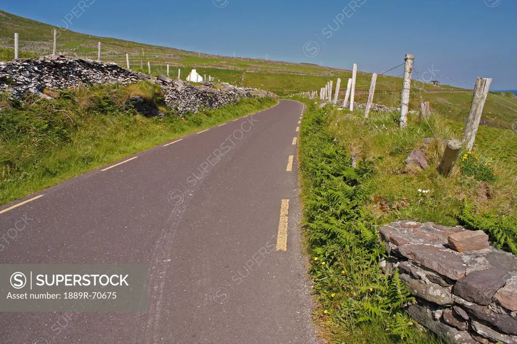 open road on slea head on the dingle peninsula, county kerry ireland