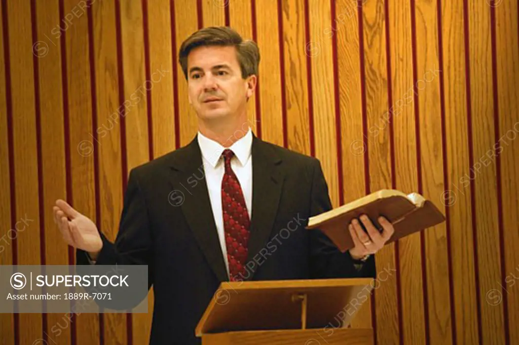 Pastor preaches from the pulpit