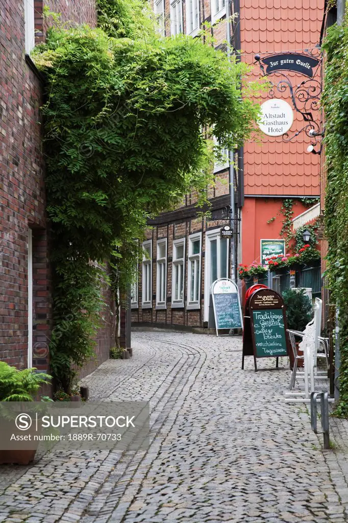 view of signs outside shops on a street, scherwin, mecklenburg, germany