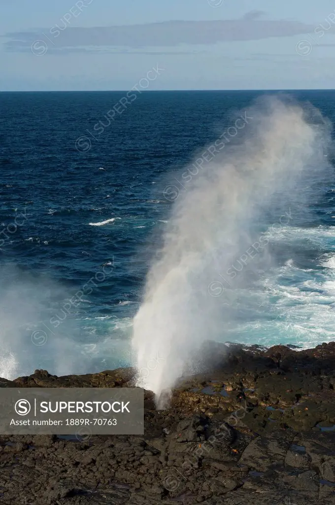 blow hole along the coast, galapagos, equador