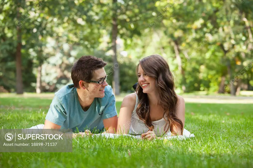 newlywed couple spending quality time together in a park, edmonton alberta canada